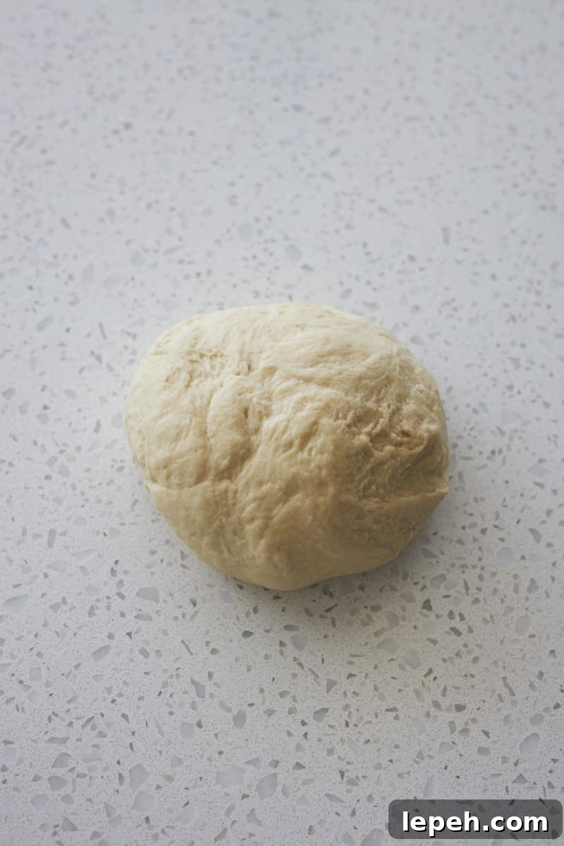 Smooth dough on a work surface.