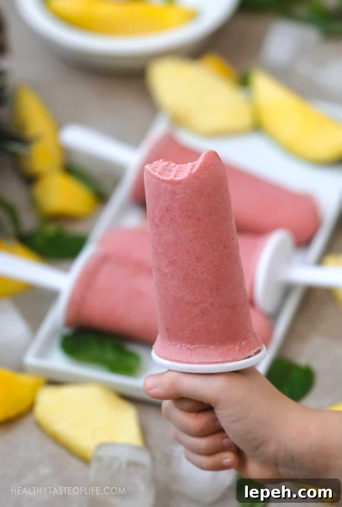 Creamy sugar free popsicles made with whole tropical fruits.