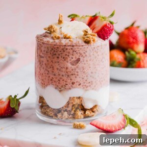 one glass jar containing strawberry banana chia pudding