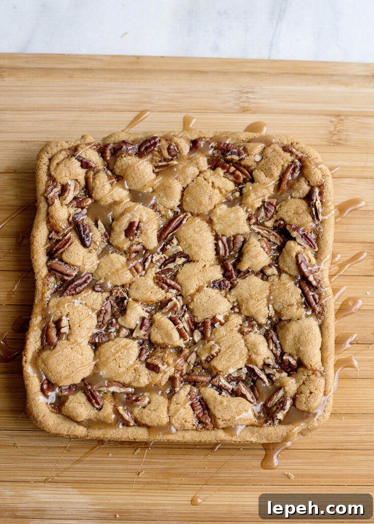 Salted Caramel Pecan Bars Drizzled with Caramel and Sea Salt