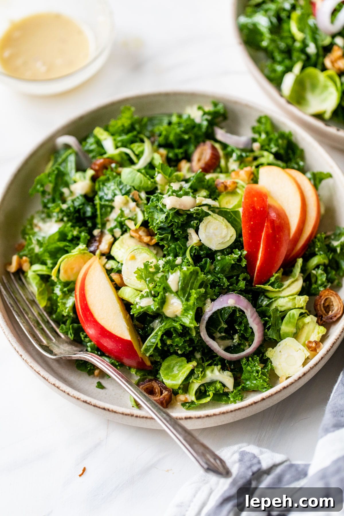 kale and brussels sprouts salad in a bowl