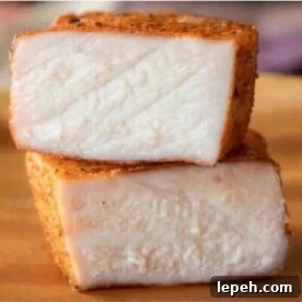 Cross section of sliced smoked pork chops stacked on top of each other.