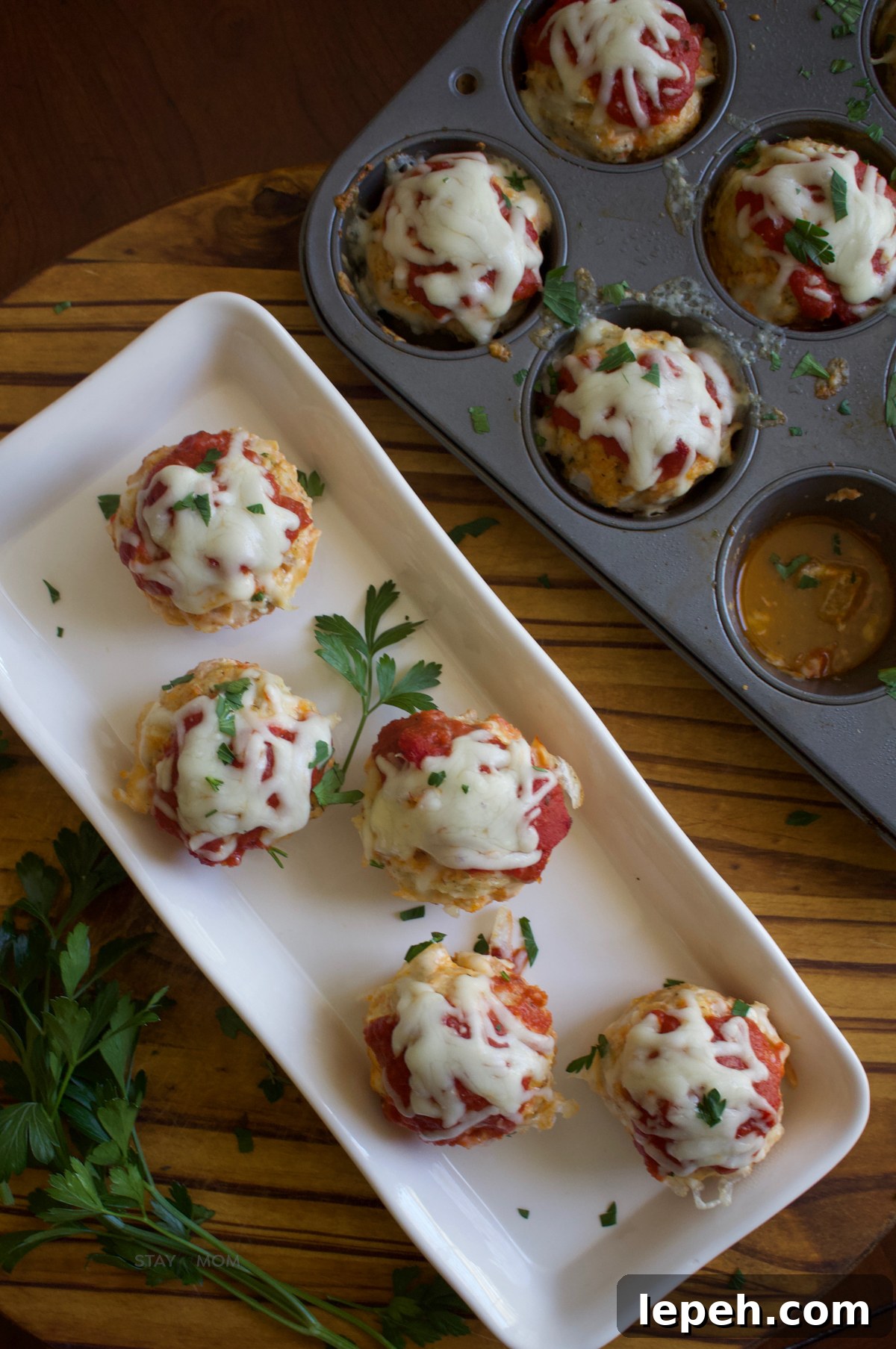 Baked chicken parmesan muffins on cooling rack