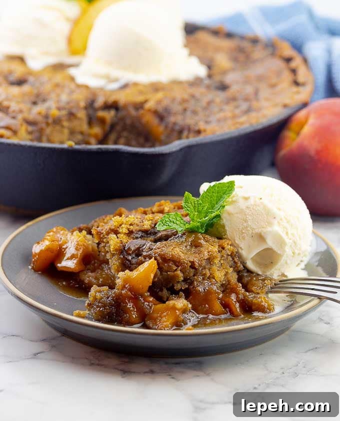 grilled fresh peach cast iron skillet cake and a plate of the cake with ice cream