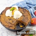 grilled fresh peach cast iron skillet cake and a plate of the cake with ice cream