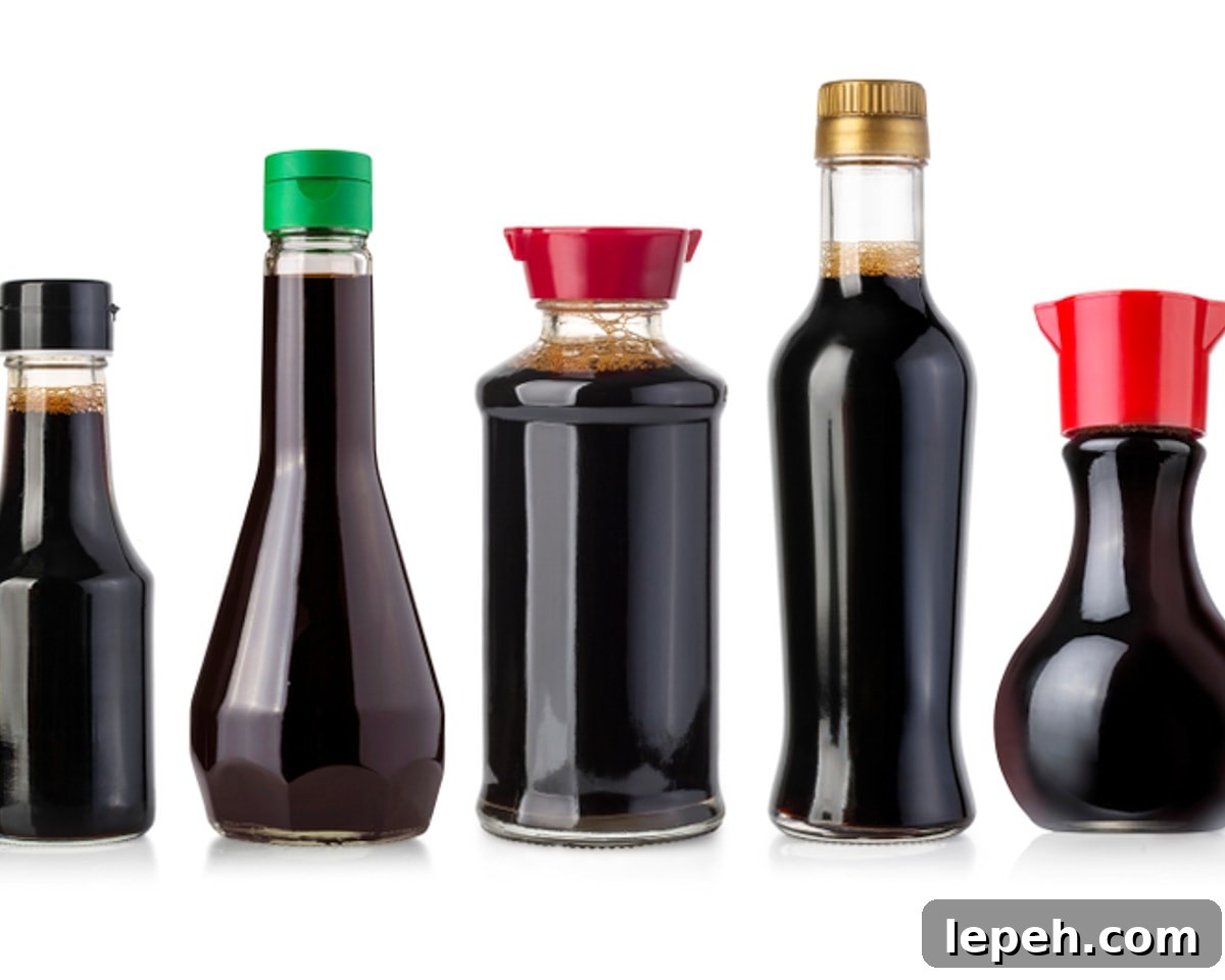 Various bottles of soy sauces in different shapes and sizes.