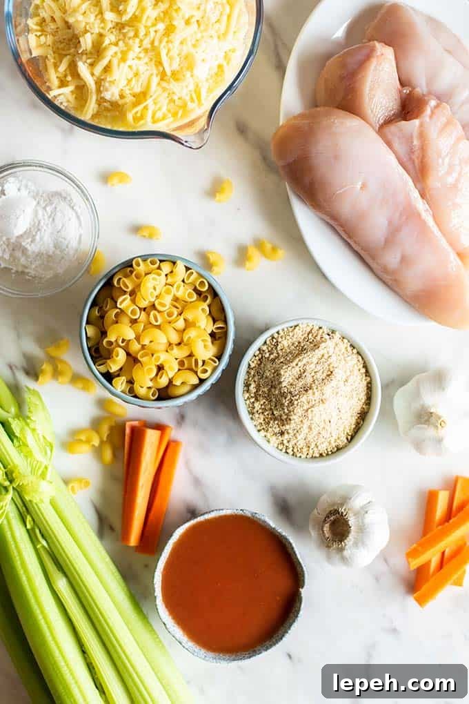The ingredients for buffalo chicken mac and cheese laid out ready to be prepared.