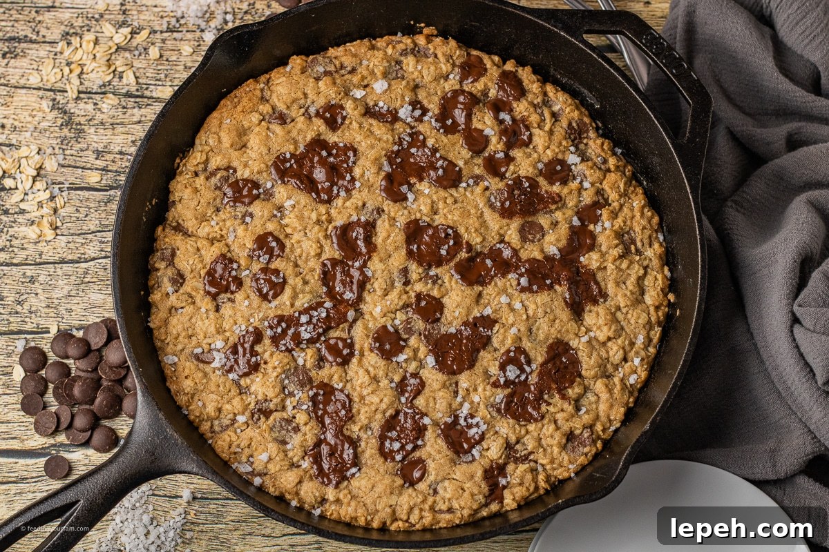oatmeal chocolate chip skillet cookie in a cast iron skillet