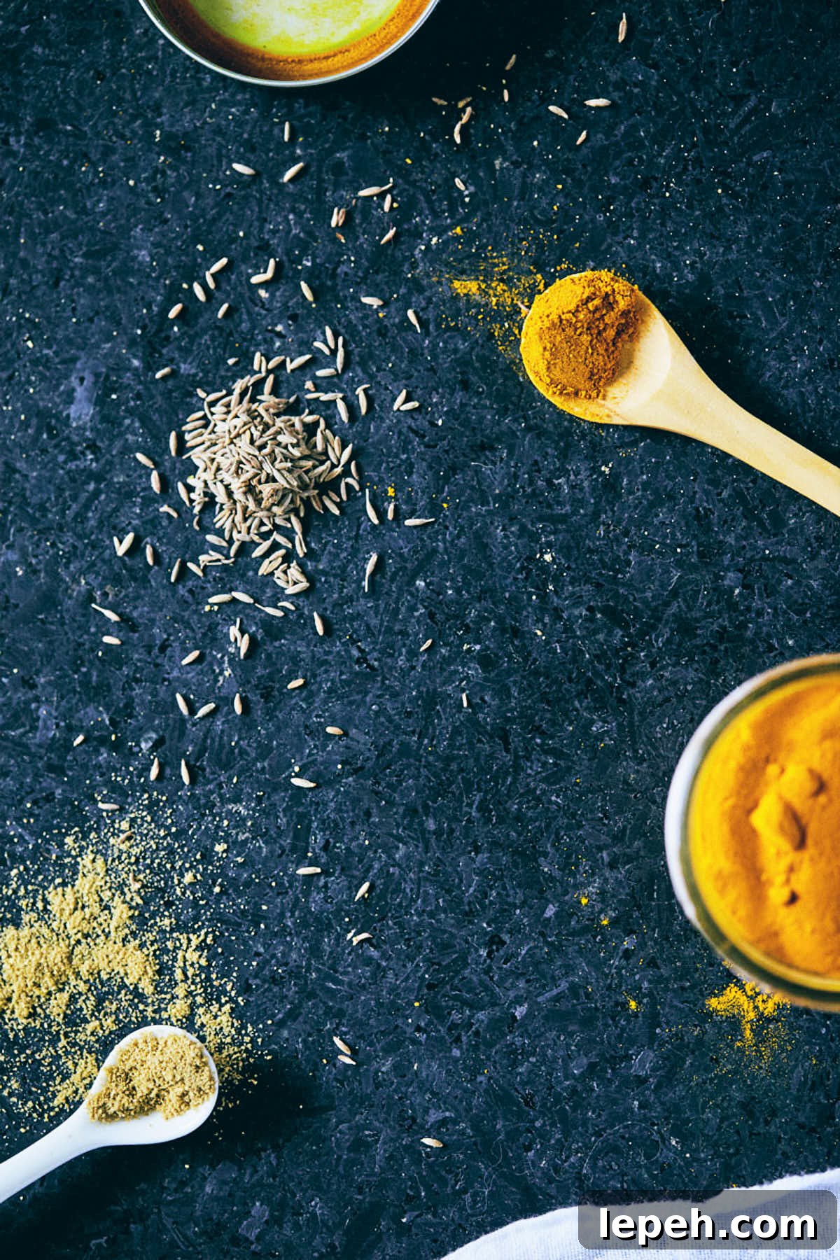 Spices for curry chickpea salad on the counter