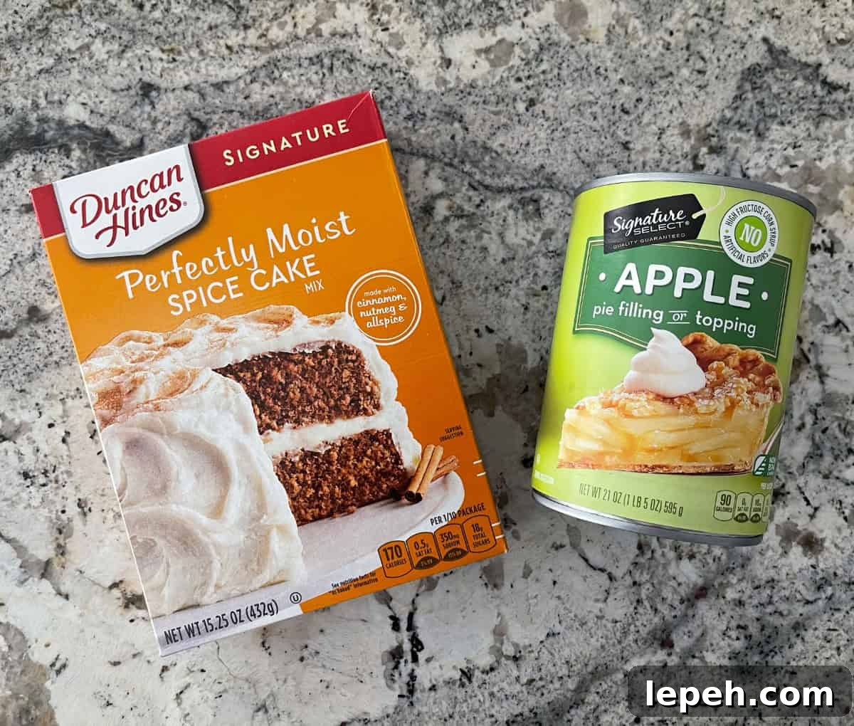 Ingredients including Duncan Hines Moist Spice Cake Mix box and can of Apple Pie Filling or Topping.