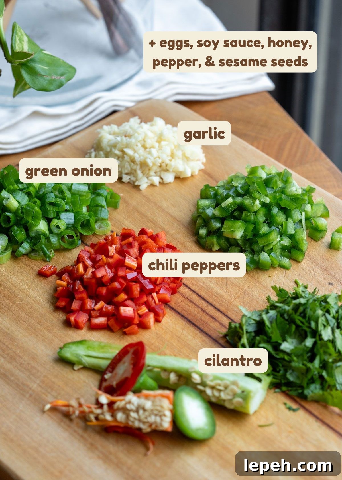mayak eggs ingredients: eggs, green onion, garlic, chili peppers, soy sauce, honey, sesame seeds, and cilantro