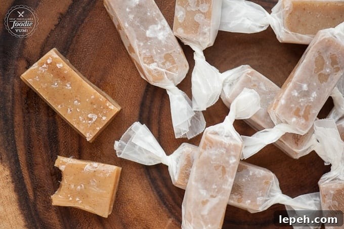 Salted Vanilla Bean Caramels Recipe — Smooth Homemade Caramels 4 a small pile of vanilla bean caramels