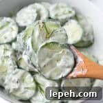 A spoonful of Greek Yogurt Cucumber Salad.